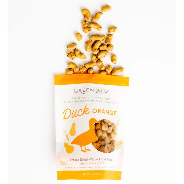 Green Juju Duck Orange Freeze Dried Whole Food Bites packaging with cashews spilling out on a white background