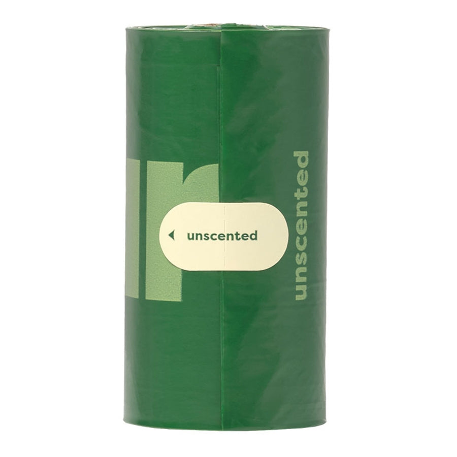 Green roll of toilet paper with 'unscented' label on a white background