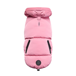 Pink dog coat with black zippers on a white background