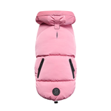 Pink dog coat with black zippers on a white background