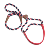A braided rope lasso with a red, white, and navy blue pattern, brown leather loop ends, and a red loop handle, shown on a plain white background.