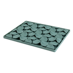 Green silicone mold tray with various shapes on a white background