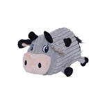 Plush toy cow on a white background