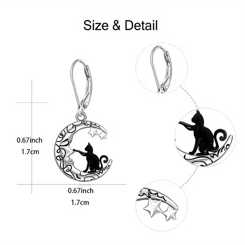 Earrings with cat and moon design, shown with measurements on a white background