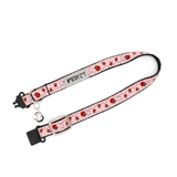 Pink dog collar with ladybug pattern and 'Worthy Dog' branding on a white background