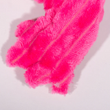 Close-up of pink fluffy fabric on a light background