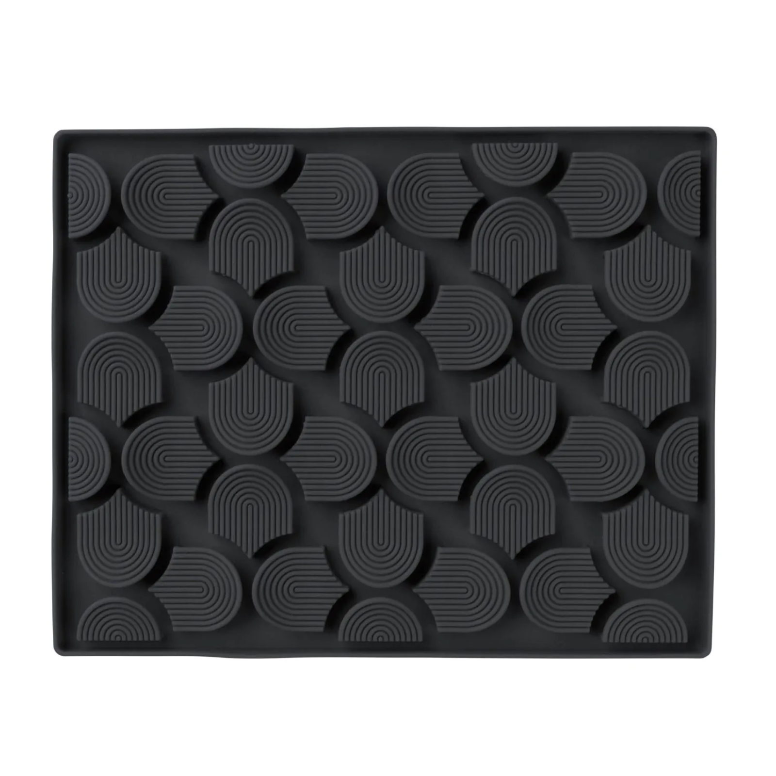 Black textured mat with geometric pattern on a white background