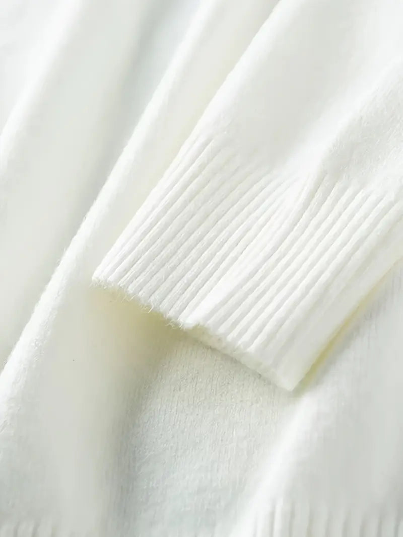 Close-up of white fabric with a textured pattern