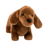 Brown plush dog toy on a white background