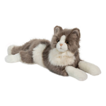 Plush toy cat lying down on a white background