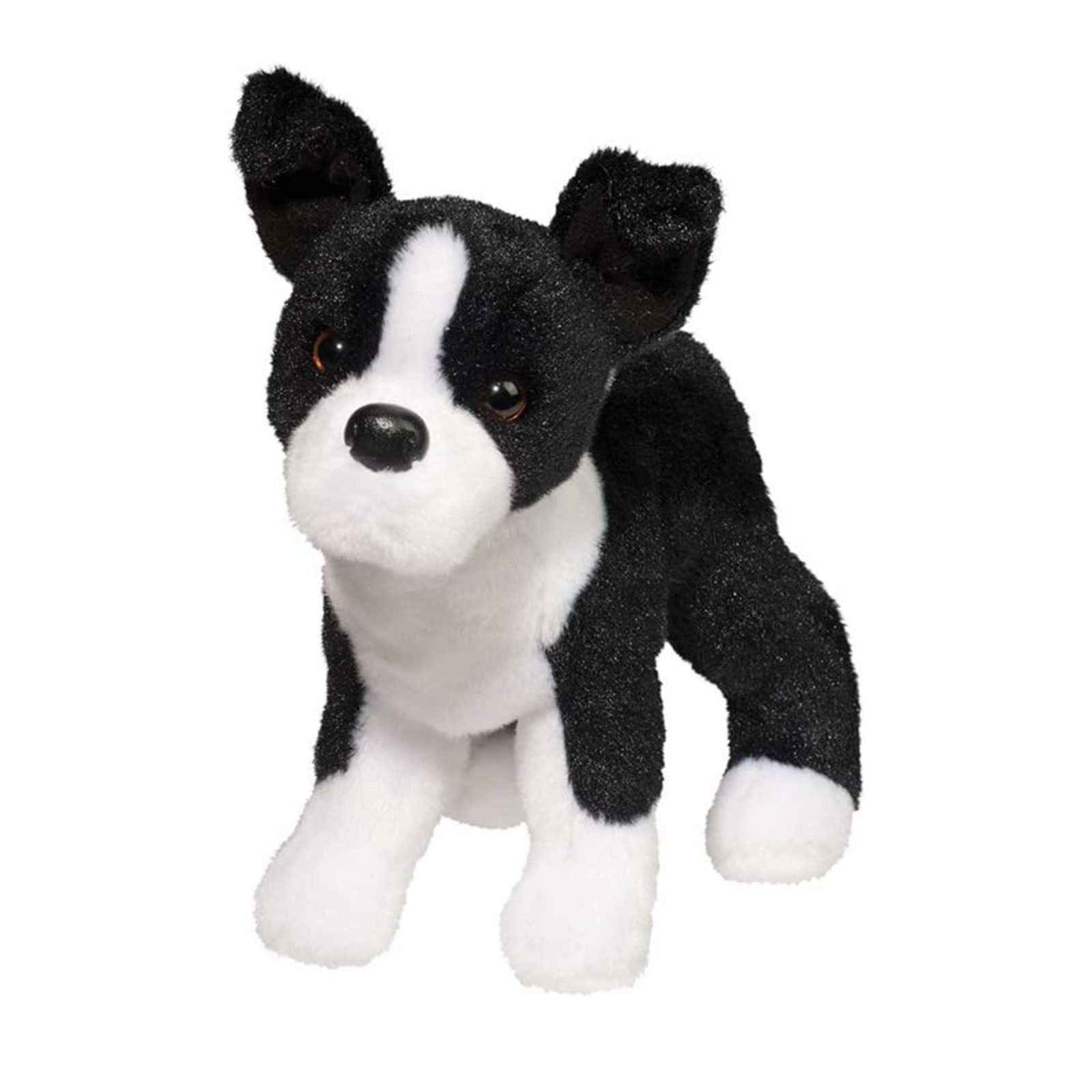 Black and white plush dog toy on a white background
