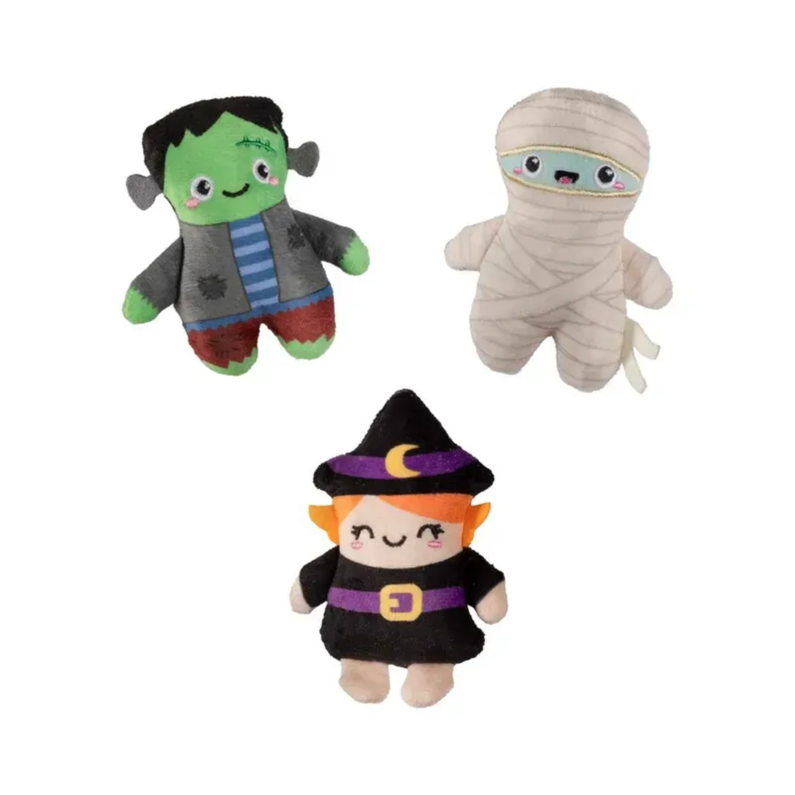 Three small plush Halloween characters on a plain white background: a green Frankenstein-style doll with gray hair and striped shirt, a beige mummy with embroidered eyes, and a witch character in a black hat and dress with purple trim and orange hair.