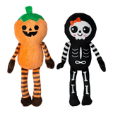 Two Halloween-themed plush toys, one resembling a pumpkin and the other a skeleton, on a white background.