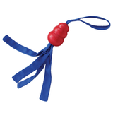 Red dog toy with blue tassels on a white background