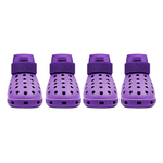 Four purple children's shoes with straps on a white background
