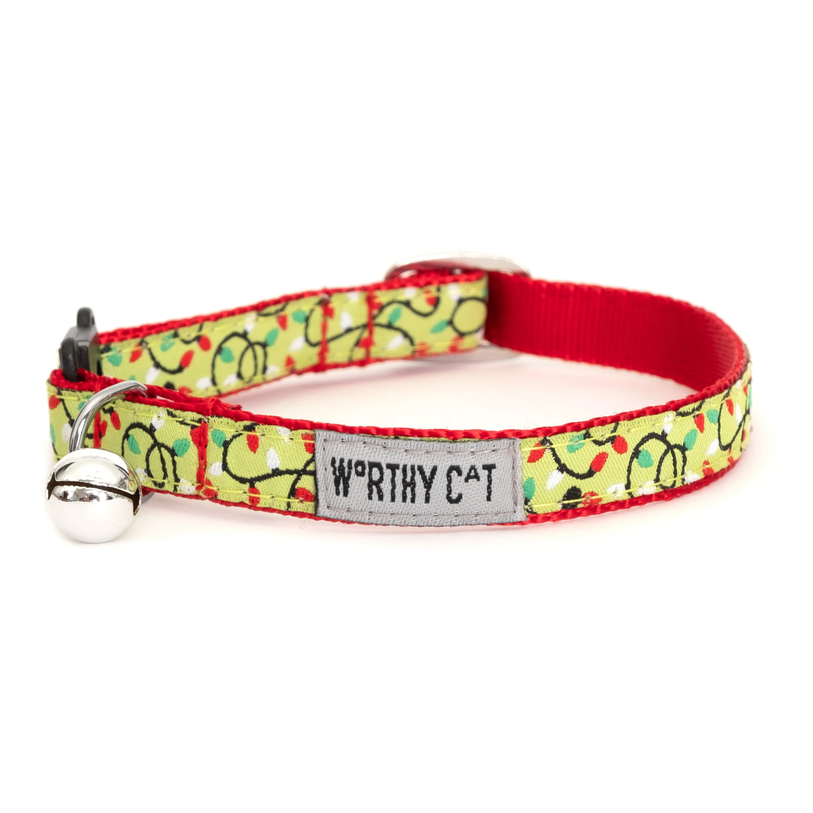 Cat collar with colorful pattern and 'Worthy Cat' tag on a white background