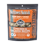 Package of Northwest Naturals raw diet for dogs with chicken and salmon recipe on an orange background.
