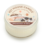 Pet House Candle labeled 'Breakfast in Bed' with illustrations of a cat and dog on a white background
