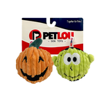 Two PETLO! dog toys in front of their retail packaging: an orange pumpkin-shaped plush toy with a black stitched face and stem, and a green monster-shaped plush toy with large white eyes and a stitched smile. The packaging card behind them shows the PETLO! brand and the text 'Together for Pets!'.