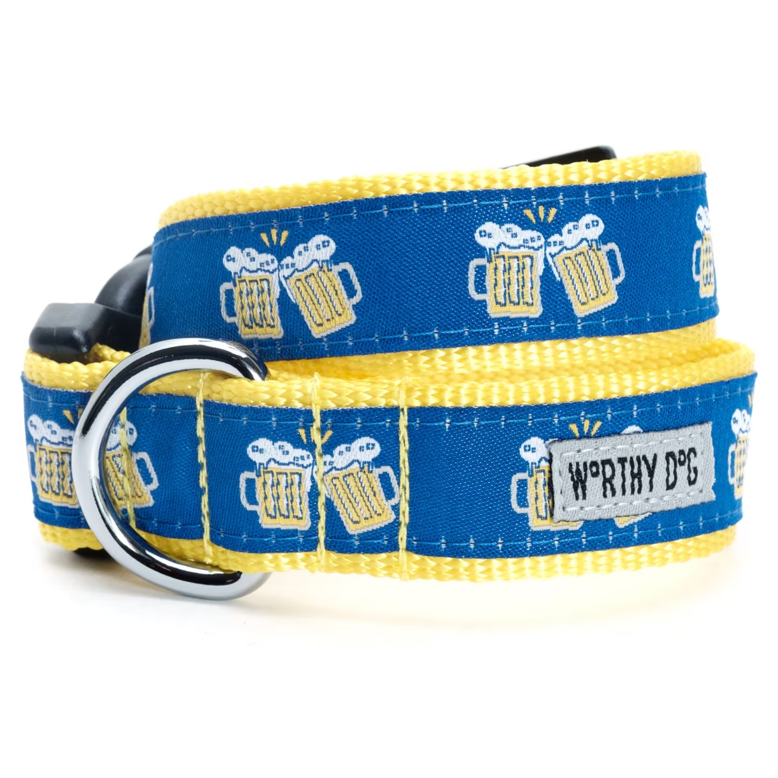 A blue and yellow dog collar with a repeating pattern of clinking beer mugs, featuring a silver metal D-ring and a black buckle. A fabric label on the collar reads 'WORTHY DOG'.
