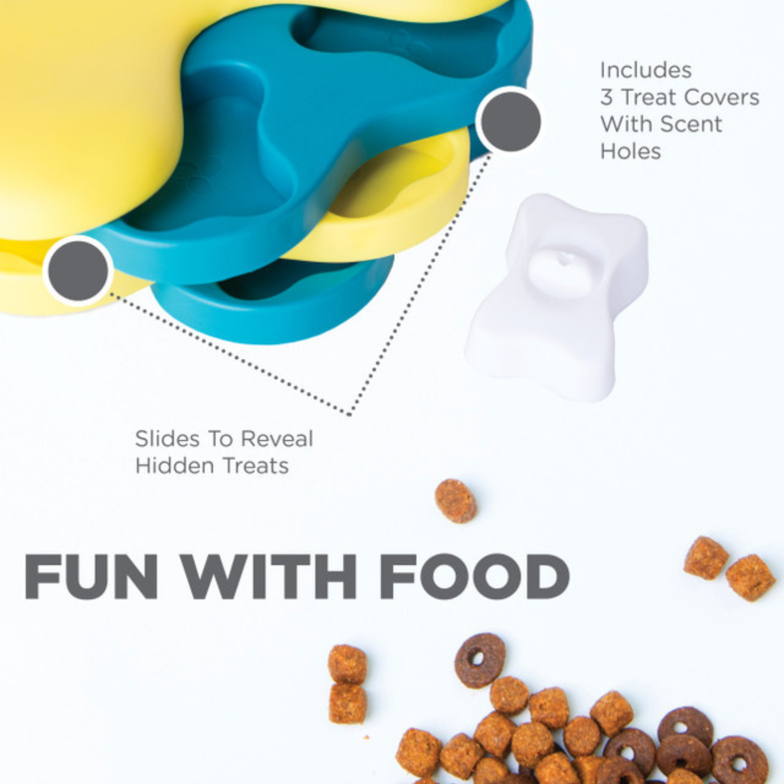 Colorful pet toy with treat covers and scattered dog treats on a white background