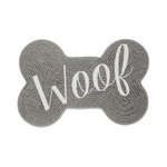 Gray bone-shaped mat with 'Woof' text on a white background
