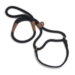 A black braided rope dog lead with brown leather accents and brass hardware, photographed on a clean white background.