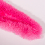 Close-up of bright pink feather boa on a white background