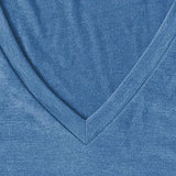Close-up of a blue fabric with a V-neck design