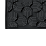 Black textured mat with geometric pattern on a white background