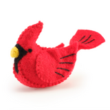 Red felt cardinal bird toy on a white background