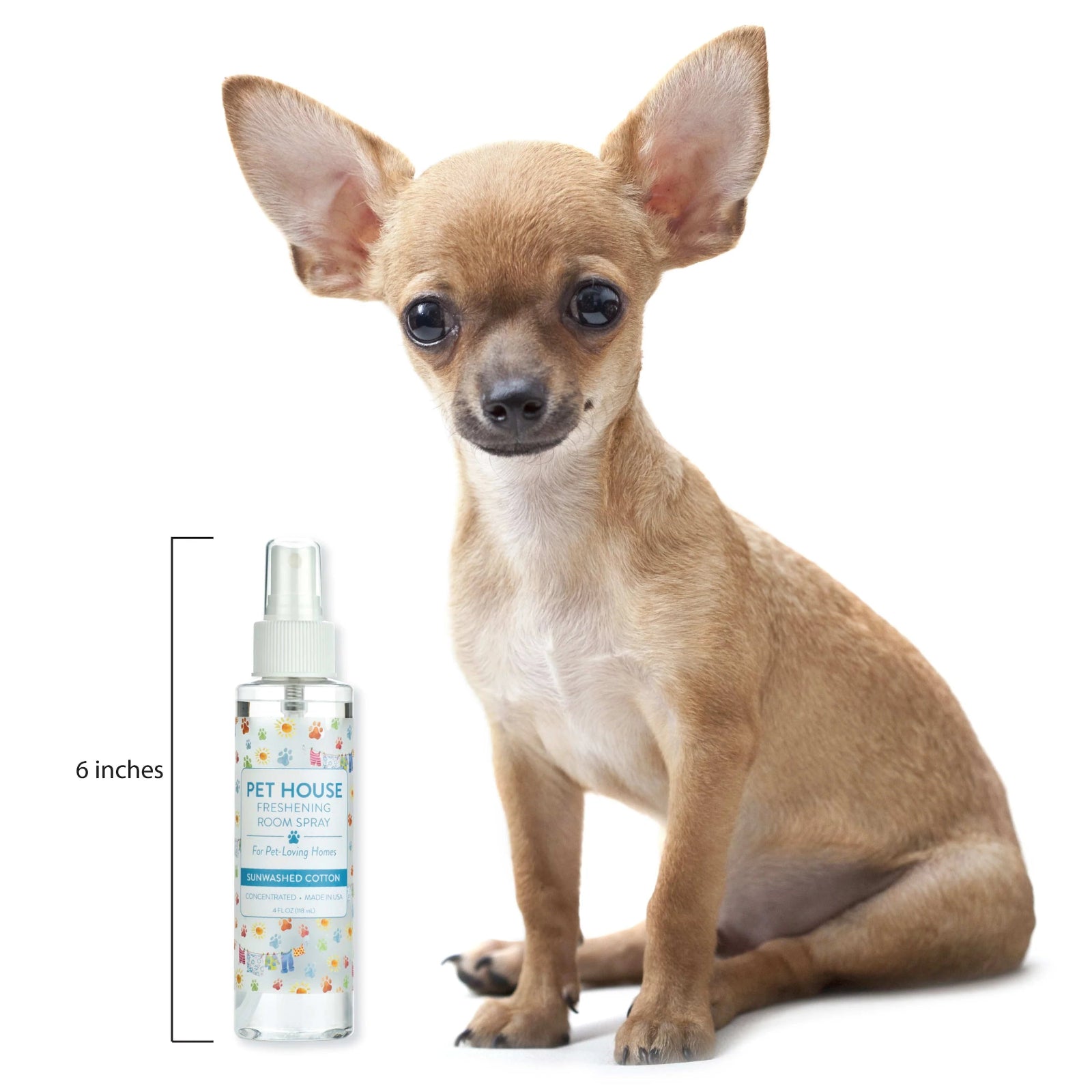Small dog sitting next to a bottle labeled 'Pet House' on a white background