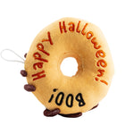 Plush donut toy with 'Happy Halloween! Boo!' text on a white background