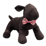 Brown plush dog toy with a floral bow tie on a white background