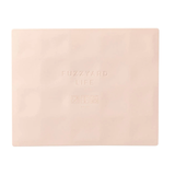 Pink notebook with 'Fuzzyard' branding on a white background