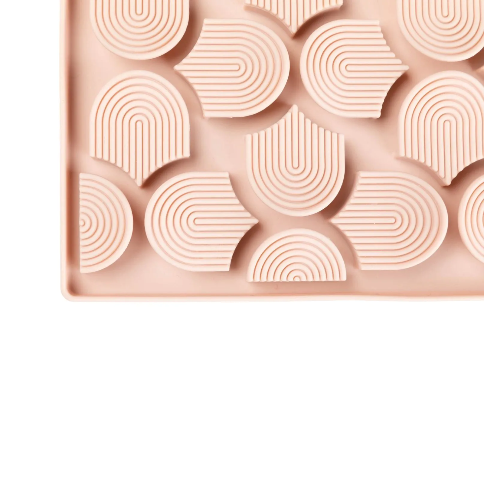 Rectangular silicone mold with geometric patterns on a white background