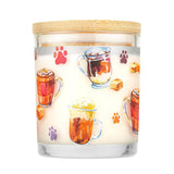 Candle with glass container and wooden lid featuring illustrations of hot beverages and paw prints on a white background.