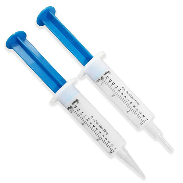 Two medical syringes with blue plungers on a white background