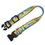 A dog collar with a colorful mountain pattern in teal, yellow, and orange, featuring black plastic buckles and a silver metal ring, shown on a white background.