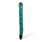 Toy resembling a snake with green and black pattern on a white background