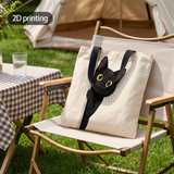 Black Cat Peeking Tote Bag