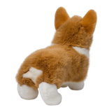 Plush toy corgi on a white background