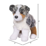 Plush toy dog with measurements on a white background