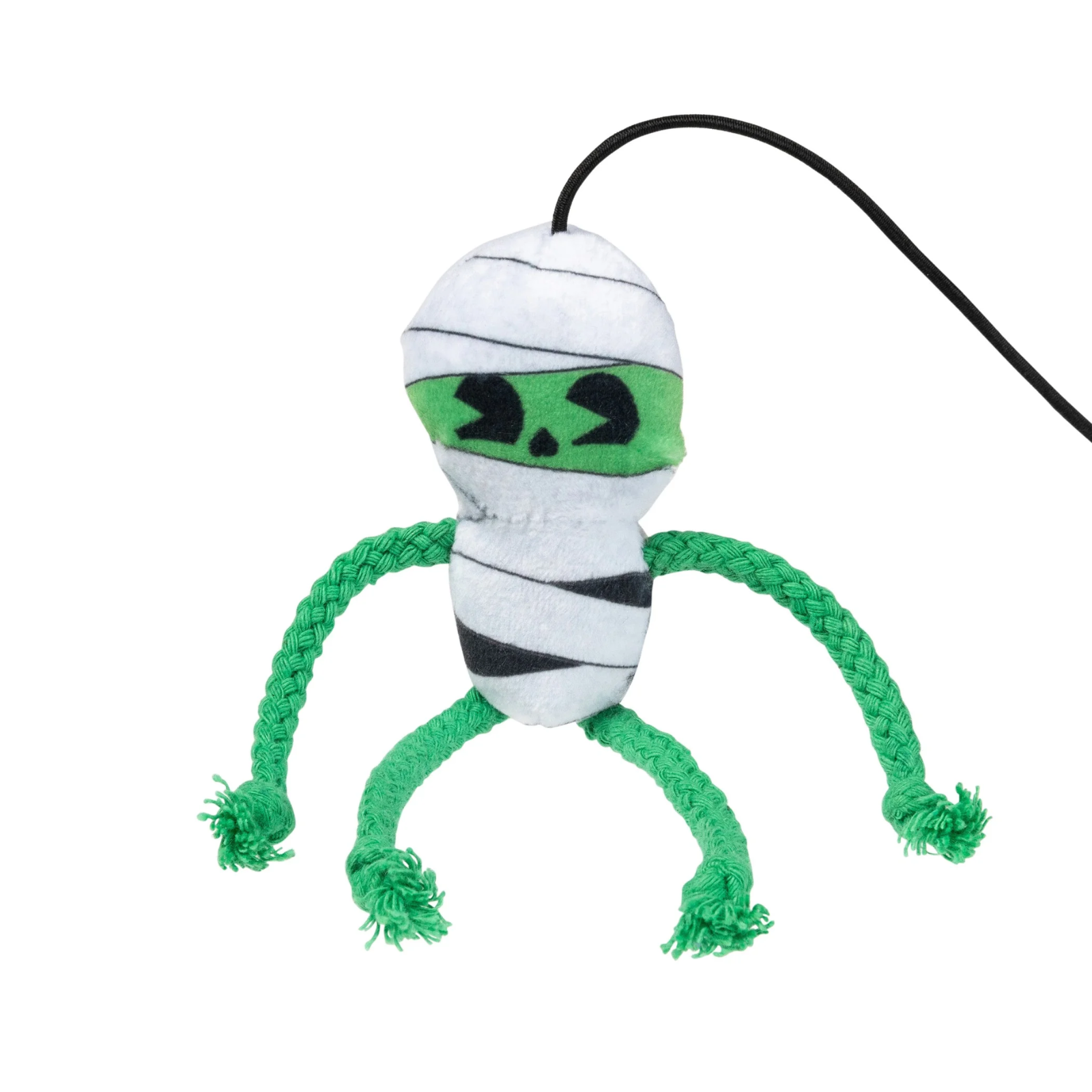 A plush dog toy shaped like a mummy, featuring white and black striped fabric body wraps, a bright green eye band with black stitched eyes and nose, and four green braided rope legs ending in frayed tips. A black hanging loop is attached at the top.