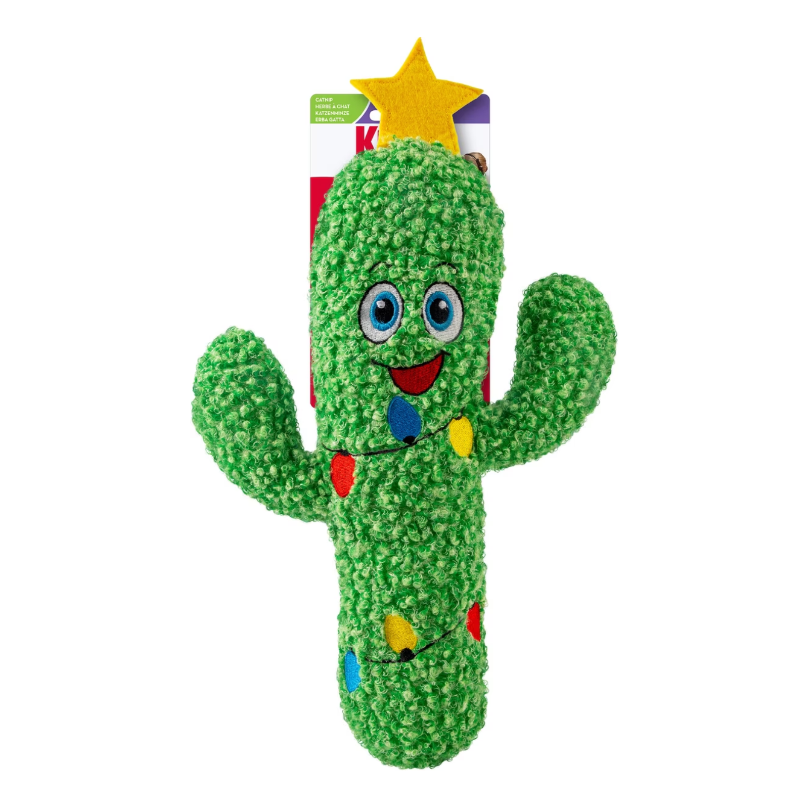 A green plush cactus dog toy with a textured, curly fabric body, featuring a smiling face, colorful Christmas lights, and a yellow star on top, shown with its retail packaging against a white background.
