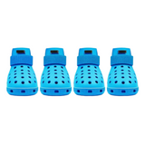 Four blue pet shoes with straps on a white background