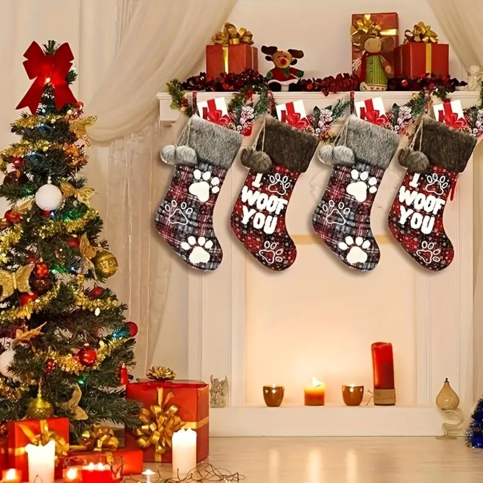 Decorative stockings with paw prints and 'I woof you' text hanging by a Christmas tree and fireplace.