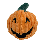 A plush orange jack-o'-lantern dog toy with a textured, ribbed fabric body, a dark green stem, and black embroidered facial features, shown on a plain white background.