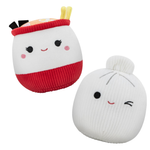 Two cute plush toys resembling baozi with red and white colors on a white background