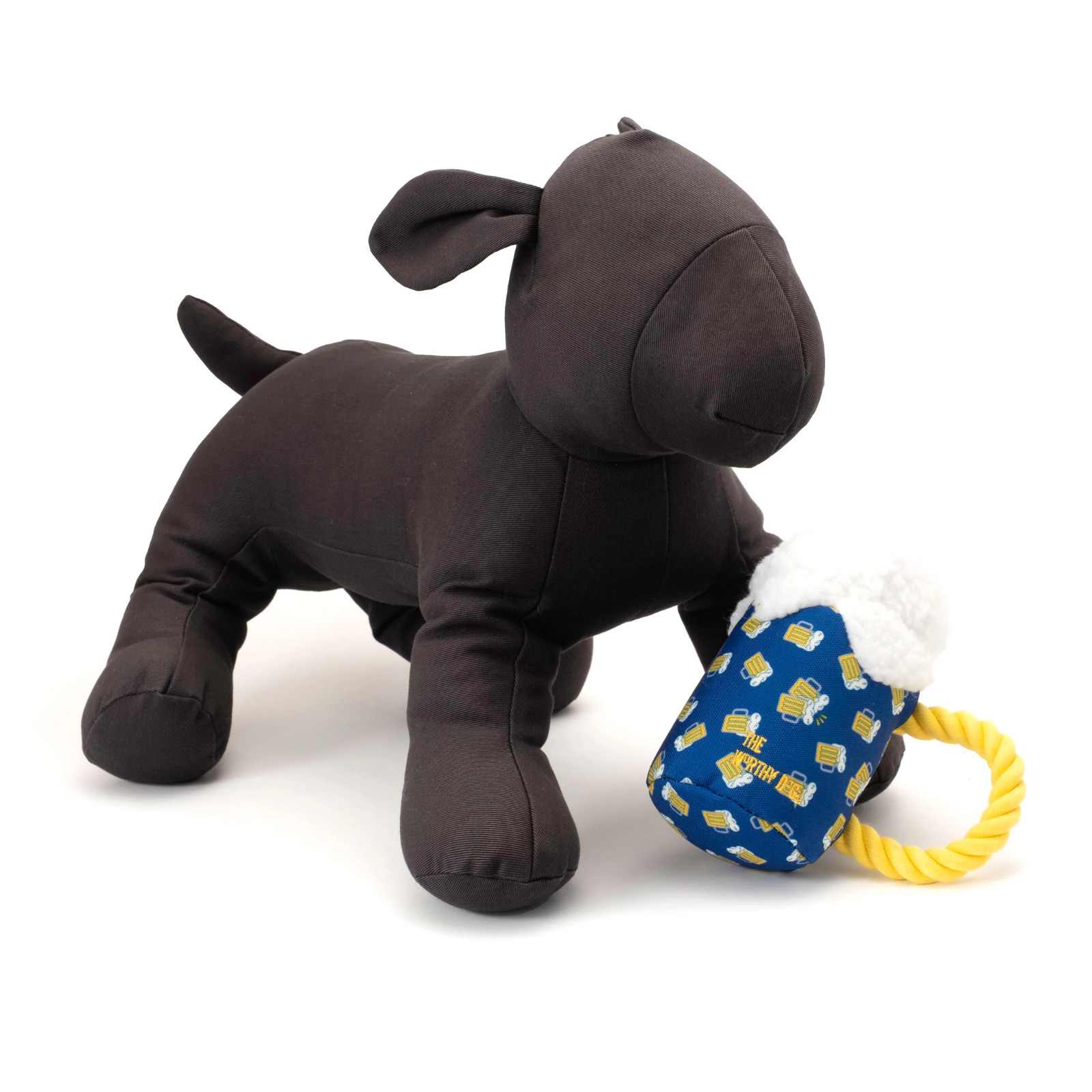 Black dog plush toy with a blue and yellow rattle on a white background